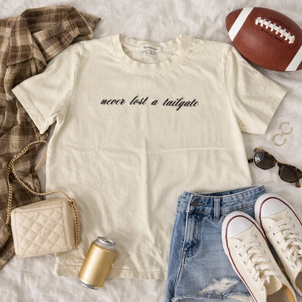 Francesca’s “Never Lost a Tailgate” Embroidered Women’s Baby Tee Size S